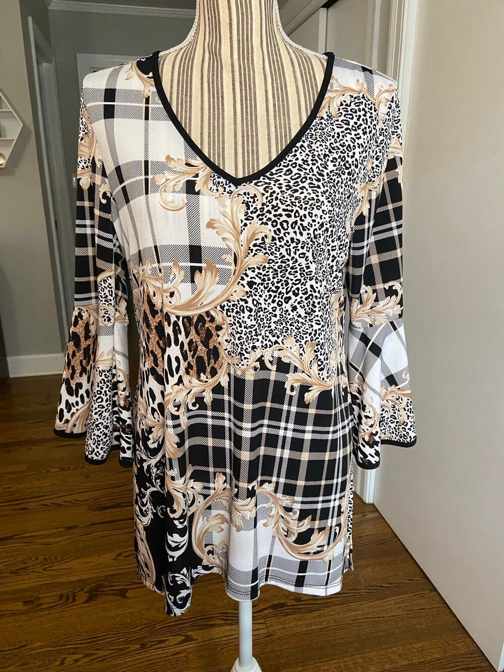 Coco Bianco black, white, & tan mixed print 3/4 sleeve knit tunic length top